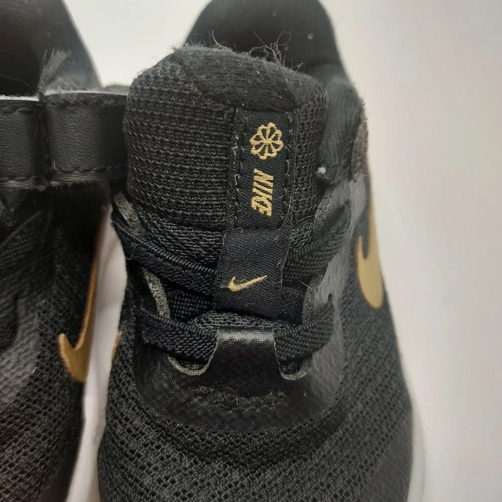 Nike Revolution Black/Gold Unisex Toddler Size 5C